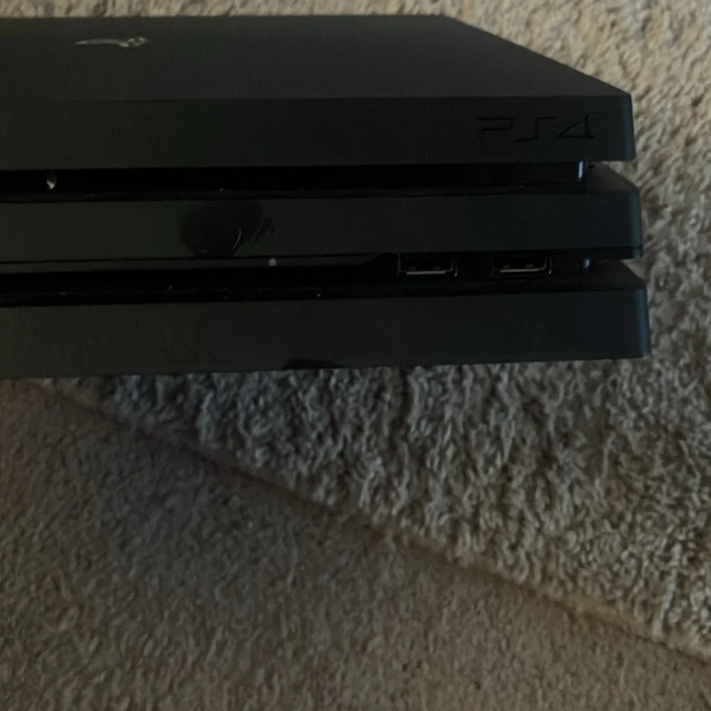 This is a PS4 in good condition it just is peeling a little bit on a cord